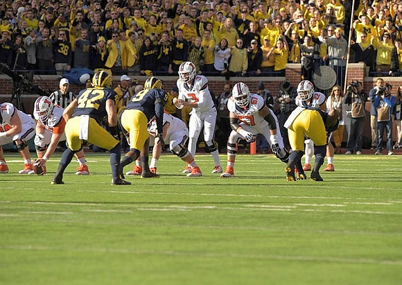 Ben Gedeon (42) and Mike McCray (9)