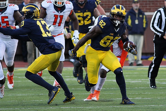 Eddie McDoom (13), Mason Cole (52), and Amara Darboh (82)