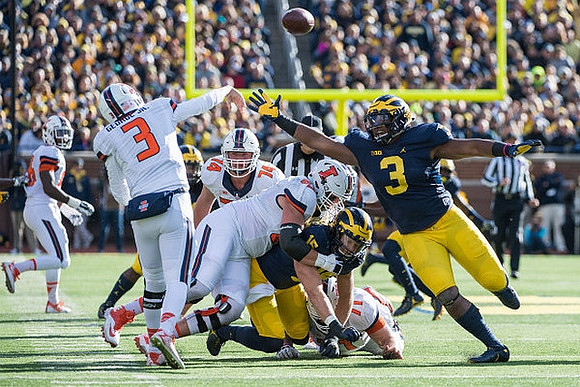 Chase Winovich (15) and Rashan Gary (3)