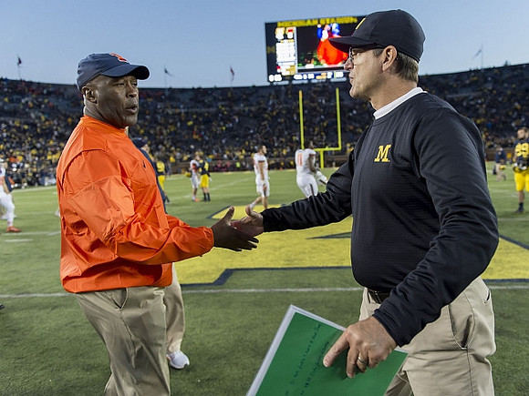 Illinois Head Coach Lovie Smith and Jim Harbaugh