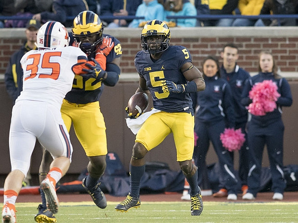 Elysee Mbem-Bosse (52) and Jabrill Peppers (5)