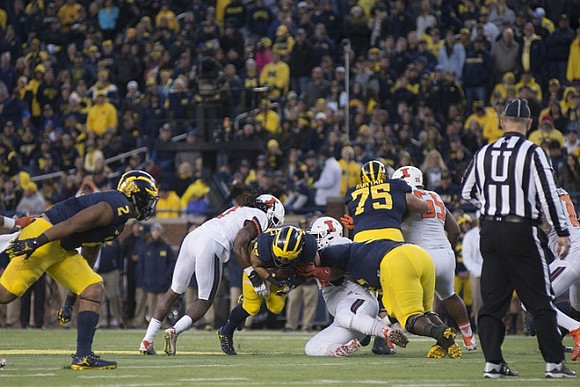 Devin Asiasi (2), Joe Hewlett (27), and Jon Runyan Jr. (75)