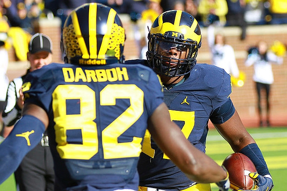 Amara Darboh (82) and Tyrone Wheatley Jr. (17)