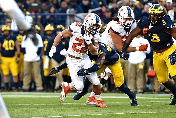 Dymonte Thomas (25) and Rashan Gary (3)
