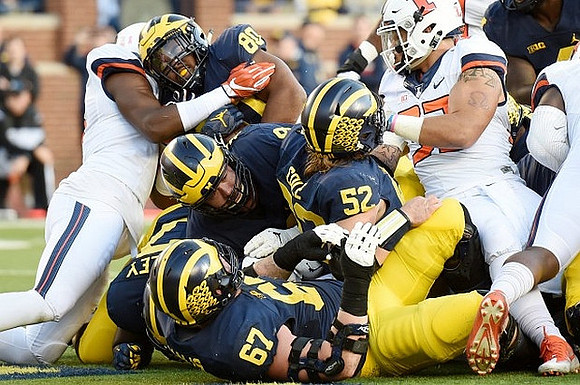 Kyle Kalis (67), Mason Cole (52), and Khalid Hill (80)