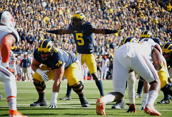 Ben Bredeson (74) and Jabrill Peppers (5)