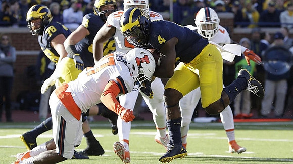 Erik Magnuson (78), Jake Butt (88), and De'Veon Smith (4)
