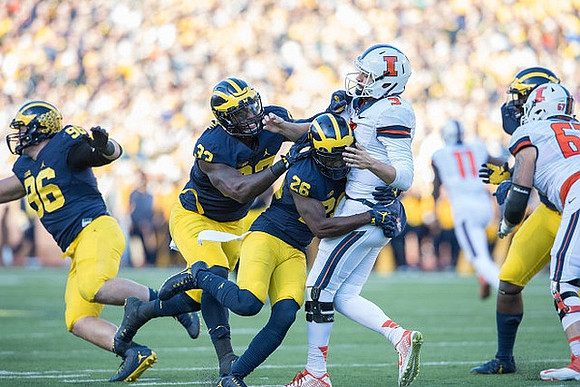 Ryan Glasgow (96), Taco Charlton (33), and Jourdan Lewis (26)