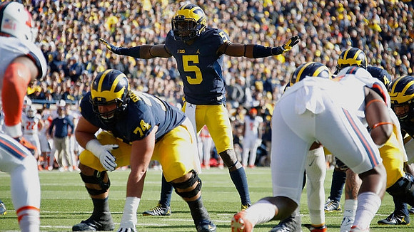 Ben Bredeson (74) and Jabrill Peppers (5)