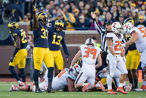 Dymonte Thomas (25), Taco Charlton (33), and Eddie McDoom (13)