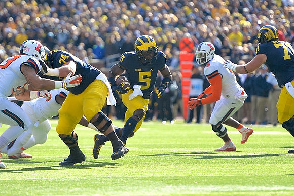 Ben Bredeson (74), Jabrill Peppers (5), and Ben Braden (71)
