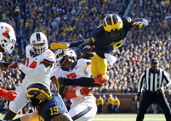 Henry Poggi (19) and Jabrill Peppers (5)