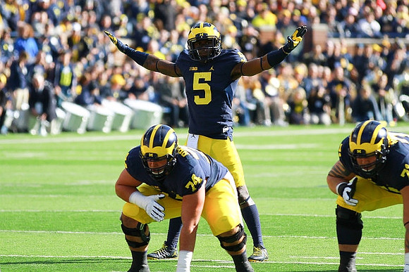 Jabrill Peppers (5), Ben Bredeson (74), and Ben Braden (71)