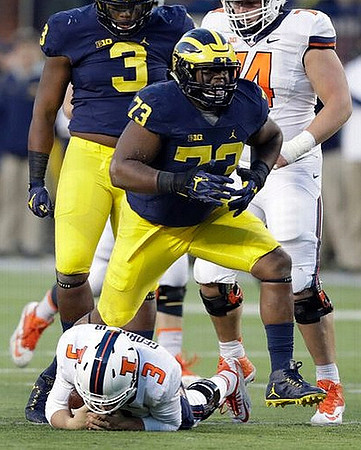 Rashan Gary (3) and Maurice Hurst (73)