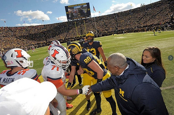 Hank Aaron, Jake Butt (88), and Chris Wormley (43)