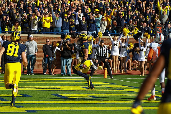 Michael Jocz (81) and Jake Butt (88)