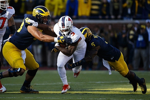 Chris Wormley (43) and Jabrill Peppers (5)