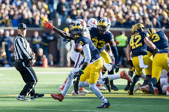 Mike McCray (9), Taco Charlton (33), Ben Gedeon (42), and Chris Wormley (43)
