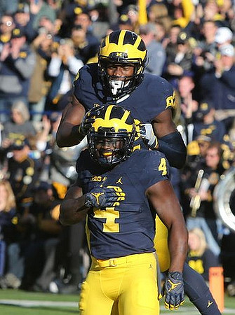 De'Veon Smith (4) and Amara Darboh (82)