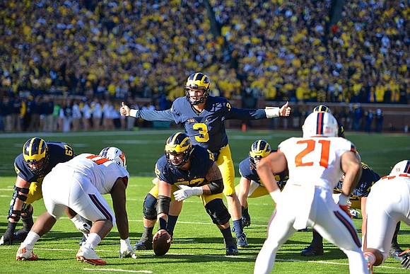 Kyle Kalis (67), Mason Cole (52), and Wilton Speight (3)