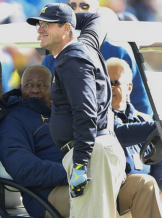 Hank Aaron and Jim Harbaugh