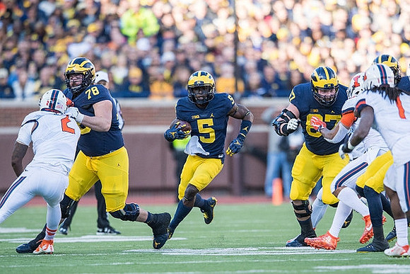Erik Magnuson (78), Jabrill Peppers (5), and Kyle Kalis (67)