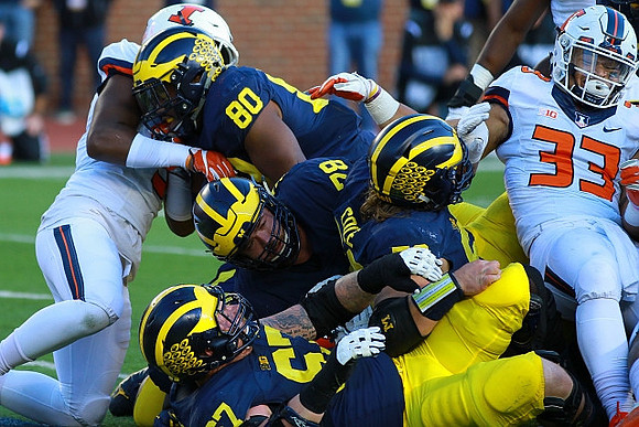 Khalid Hill (80), Erik Magnuson (78), Kyle Kalis (67), and Mason Cole (52)