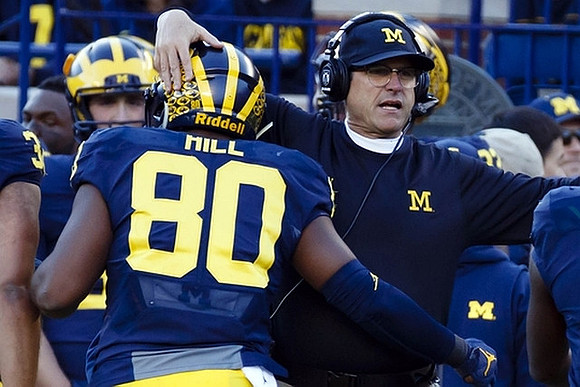 Khalid Hill (80) and Jim Harbaugh