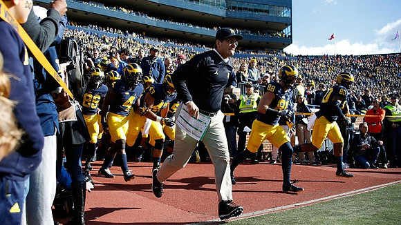 Jim Harbaugh and Michigan Team