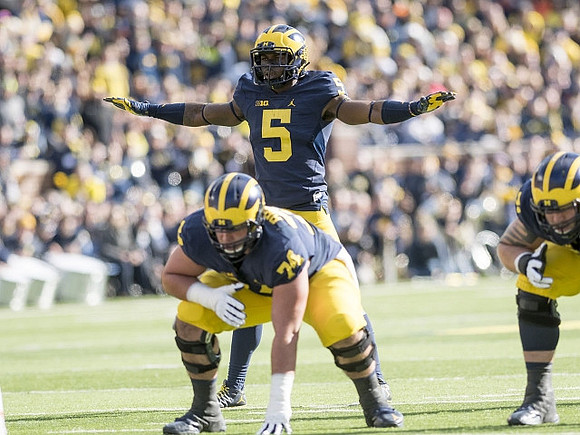 Ben Bredeson (74) and Jabrill Peppers (5)