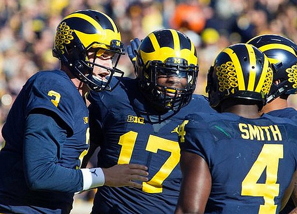 Wilton Speight (3), Tyrone Wheatley Jr. (17), and De'Veon Smith (4)