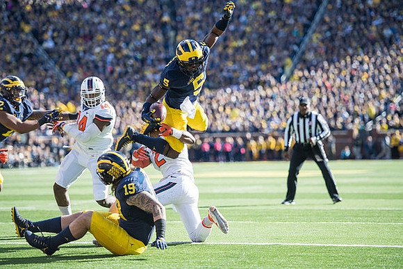 Henry Poggi (19) and Jabrill Peppers (5)