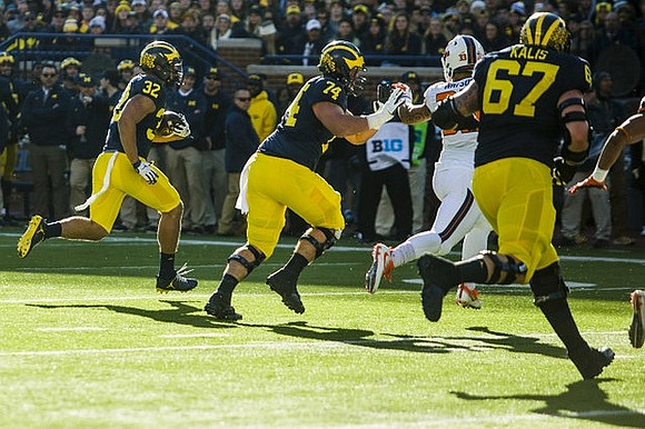 Ty Isaac (32), Ben Bredeson (74), and Kyle Kalis (67)