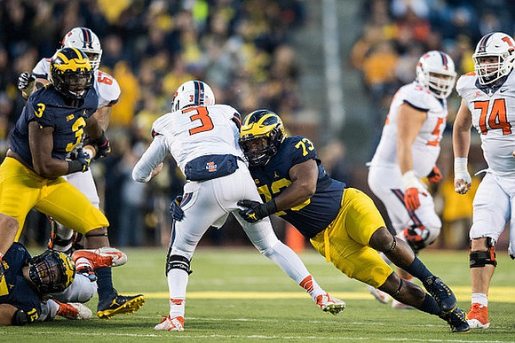 Rashan Gary (3) and Maurice Hurst (73)