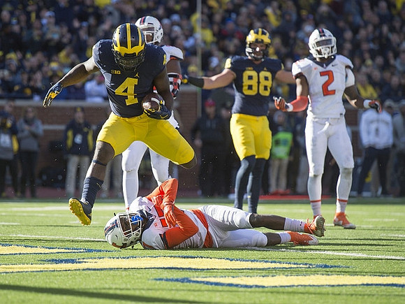 De'Veon Smith (4) and Jake Butt (88)