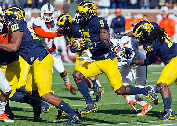 Khalid Hill (80), Jabrill Peppers (5), and Devin Bush (10)