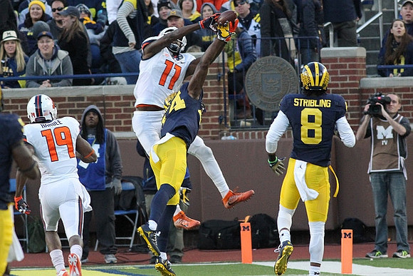 Delano Hill (44) and Channing Stribling (8)