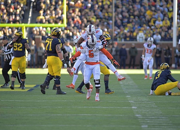 Mason Cole (52), Ben Braden (71), and Wilton Speight (3)