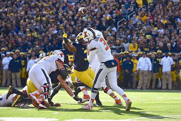 Chase Winovich (15) and Rashan Gary (3)