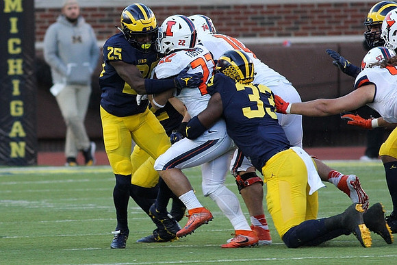 Dymonte Thomas (25) and Taco Charlton (33)