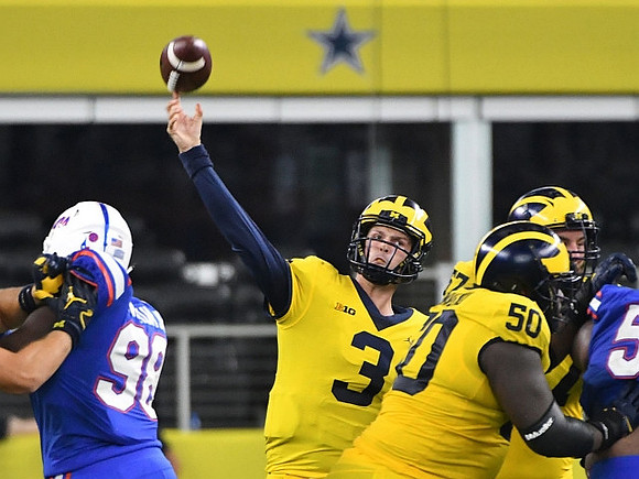 Wilton Speight (3) and Michael Onwenu (50)