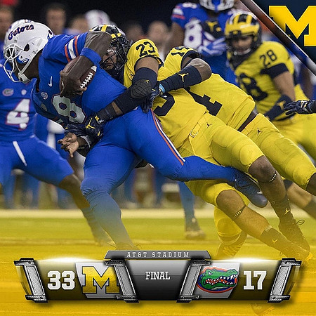 Tyree Kinnel (23), Josh Metellus (14), and Brandon Watson (28)