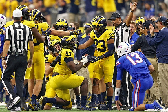 Noah Furbush (59), Lawrence Marshall (93), and Tyree Kinnel (23)