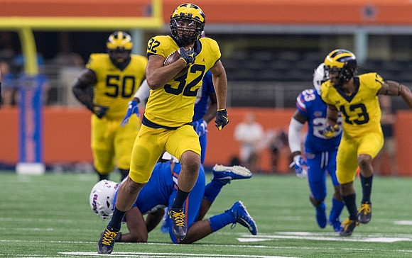 Michael Onwenu (50), Ty Isaac (32), and Eddie McDoom (13)