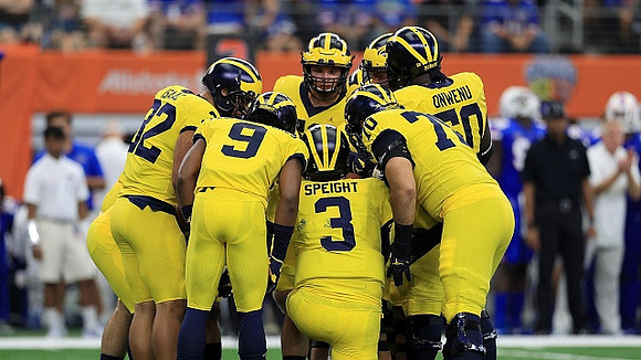 Ty Isaac (32), Donovan Peoples-Jones (9), Wilton Speight (3), Nolan Ulizio (70), and Michael Onwenu (50)