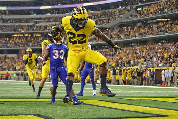 Wilton Speight (3), Zach Gentry (83), and Karan Higdon (22)