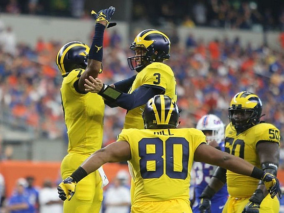 Tarik Black (7), Wilton Speight (3), Khalid Hill (80), and Michael Onwenu (50)