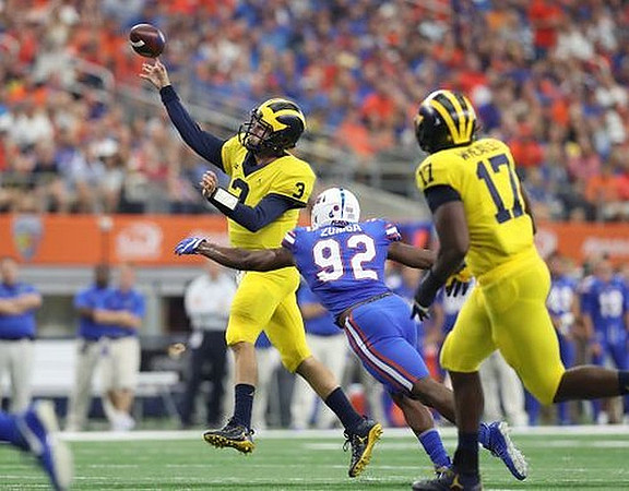 Wilton Speight (3) and Tyrone Wheatley Jr. (17)