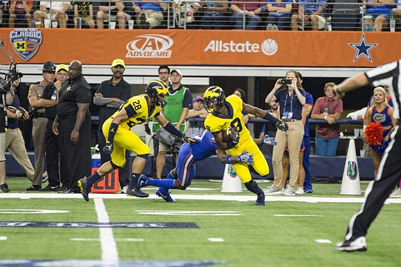 Brandon Watson (28) and Donovan Peoples-Jones (9)