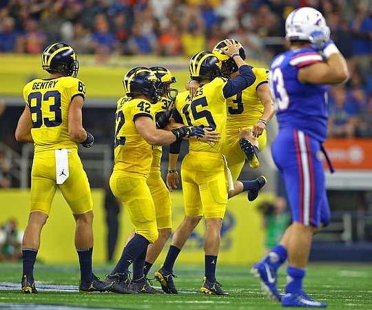 Zach Gentry (83), Ben Mason (42), Garrett Moores (15), and Quinn Nordin (3)